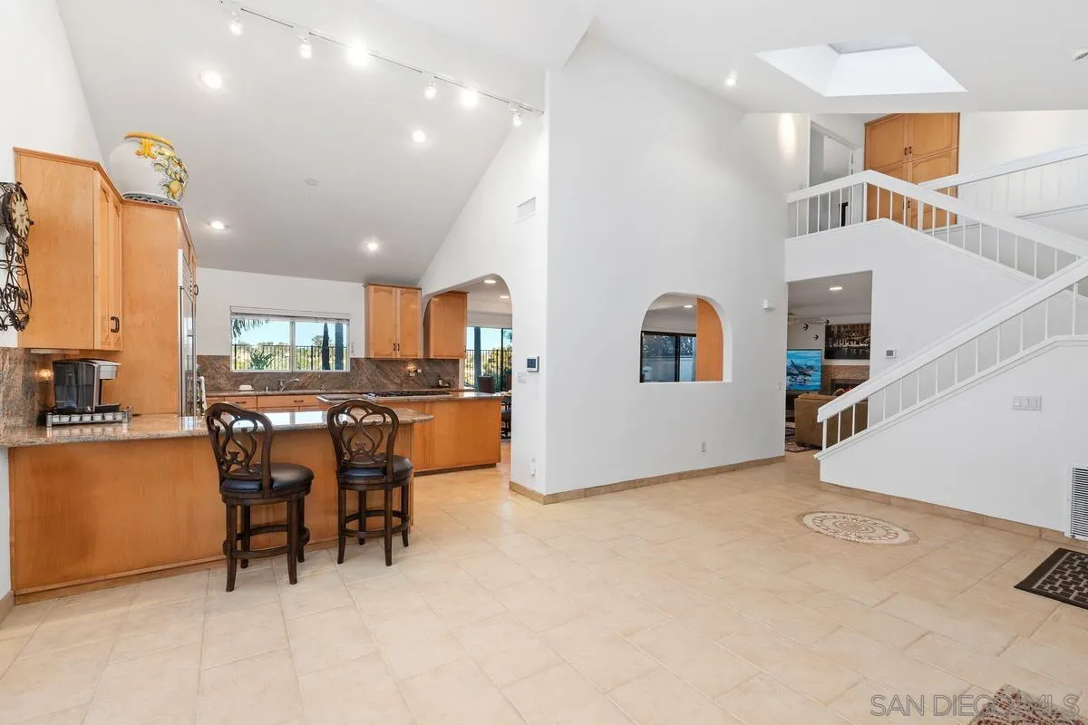 445 Via Savoy Encinitas, CA 92024 - Photo 8 of 39 a view of kitchen and kitchen with furniture
