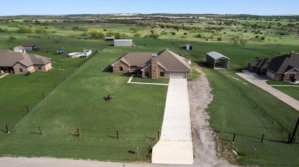 461 Pearson Ranch Road Azle, TX 76020 - Photo 8 of 40 Welcome to the country lifestyle. Over 2 acres w pool, sports court and workshop.