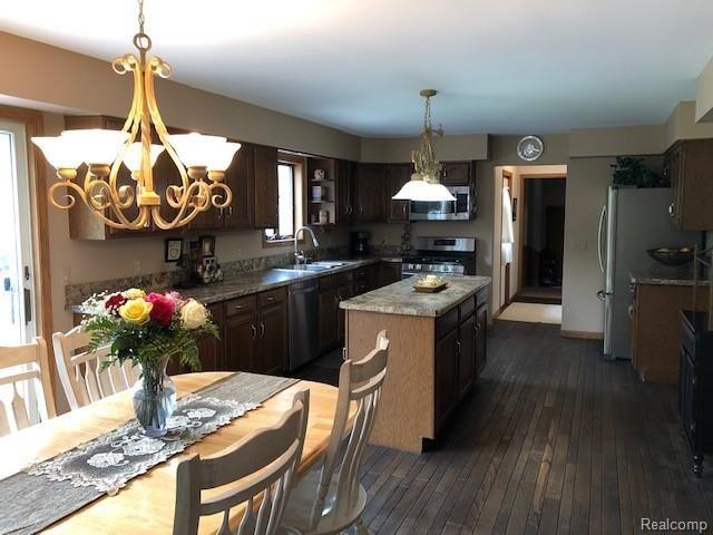 3250 Mason Road Howell, MI 48843 - Photo 6 of 50 Kitchen and eating area have hardwood floors