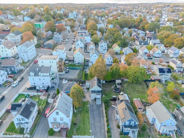 an aerial view of a city with lots of residential buildings