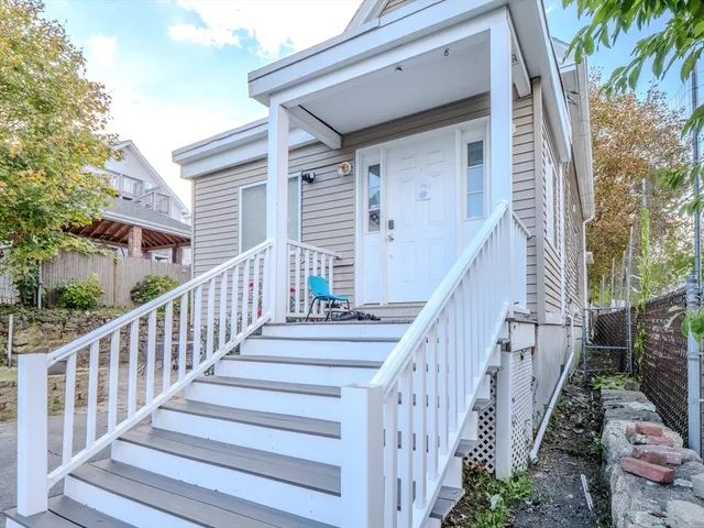 a view of staircase with wooden floor and fence