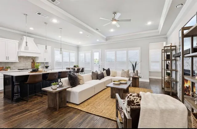a living room with furniture and a table