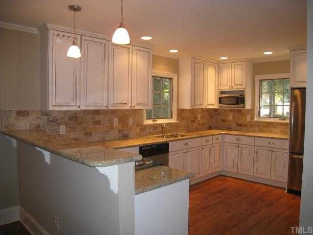 704 Davidson Street Raleigh, NC 27609 - Photo 3 of 12 beautiful tile, countertops and appliances Kitchen