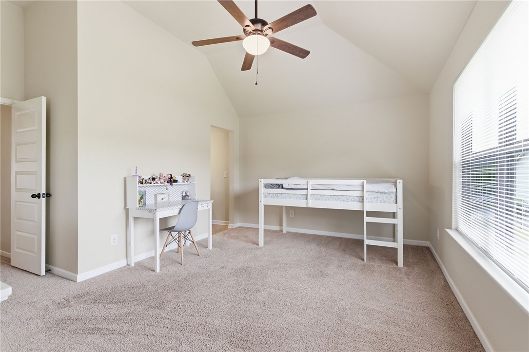 138 Buckland Drive Anderson, SC 29621 - Photo 39 of 49 This spacious bedroom offers high vaulted ceilings and abundant natural light through large windows.