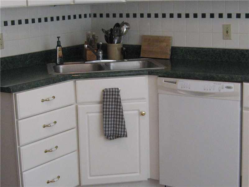 244 Falls Village Road Plum, PA 15239 - Photo 5 of 13 Kitchen. Includes dishwasher, disposal, microwave, gas range, refrigerator, pantry
