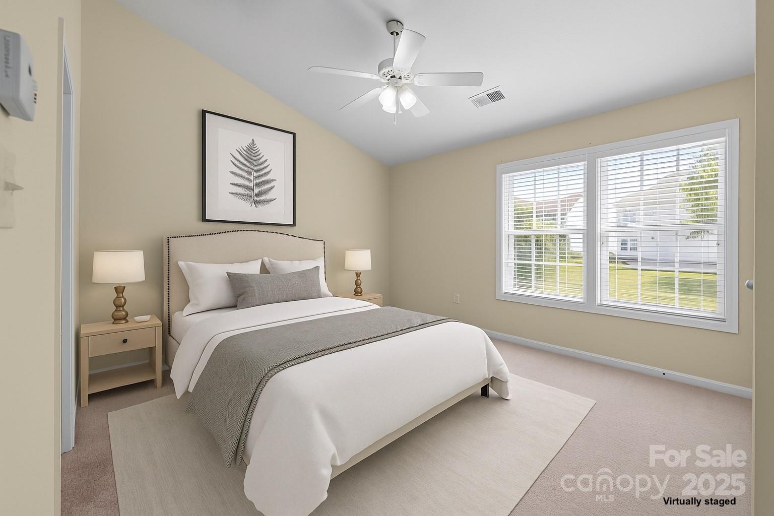 8809 Starnes Randall Road Charlotte, NC 28215 - Photo 15 of 28 a bedroom with bed and a window