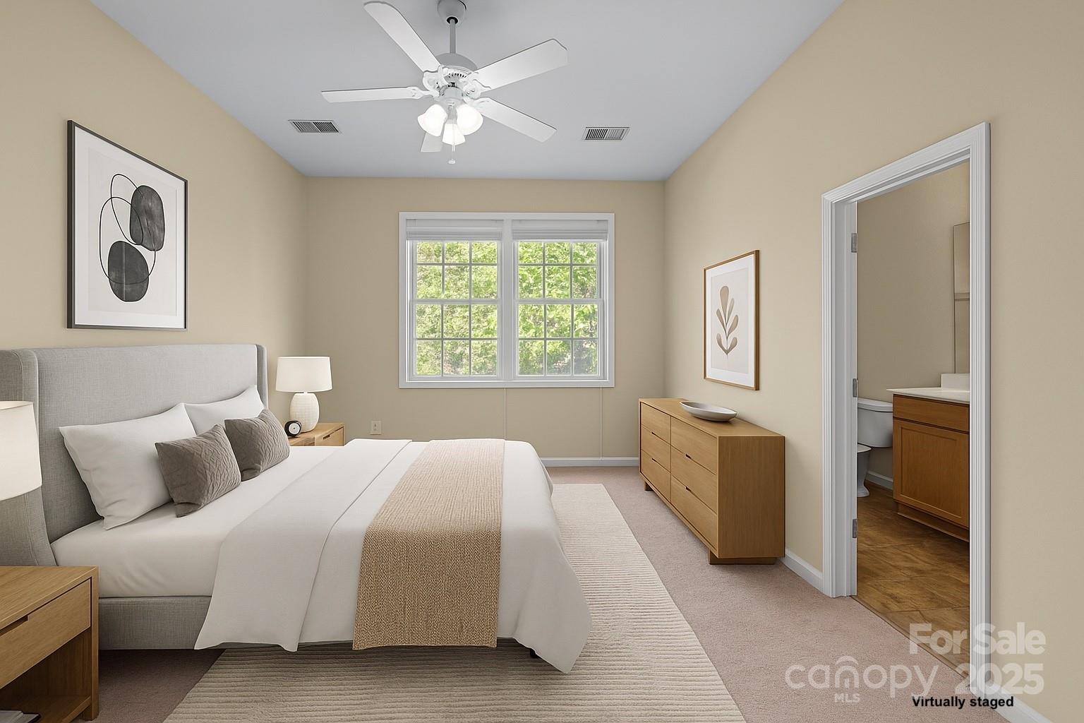 8809 Starnes Randall Road Charlotte, NC 28215 - Photo 18 of 28 a bedroom with bed and window