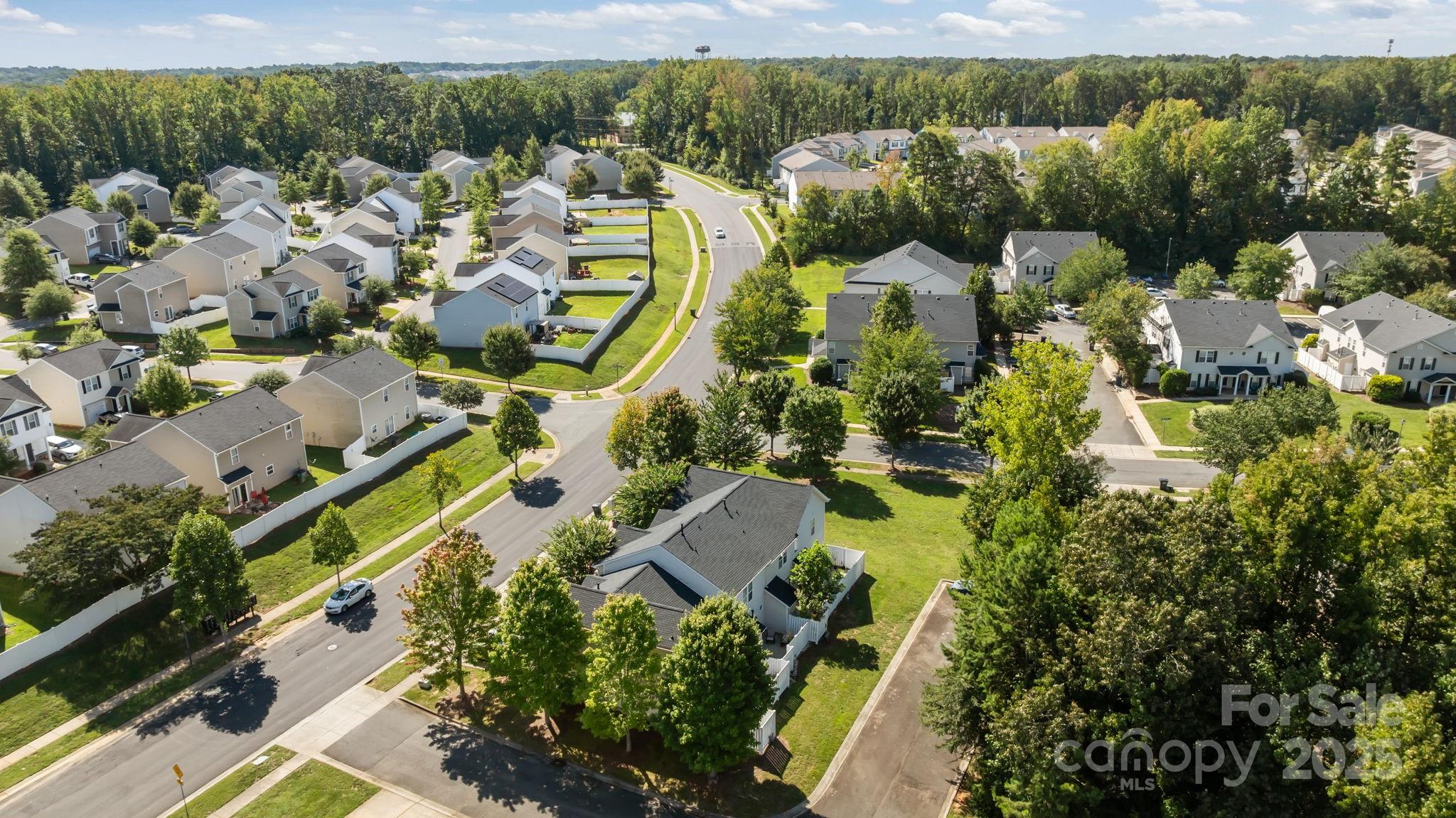 8809 Starnes Randall Road Charlotte, NC 28215 - Photo 26 of 28 an aerial view of residential houses with outdoor space