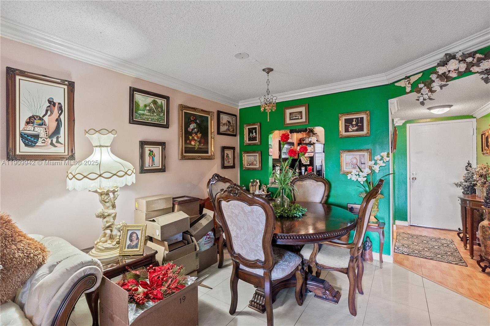 3199 Foxcroft Road, Unit 314 Miramar, FL 33025 - Photo 5 of 25 a view of a dining room with furniture and wooden floor