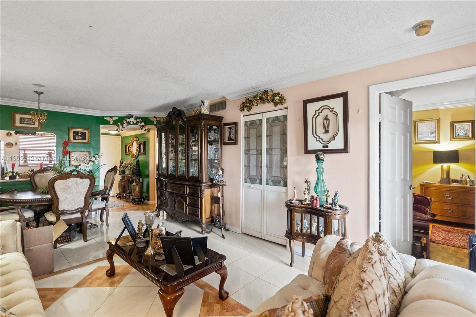 3199 Foxcroft Road, Unit 314 Miramar, FL 33025 - Photo 9 of 25 a living room with furniture and wooden floor