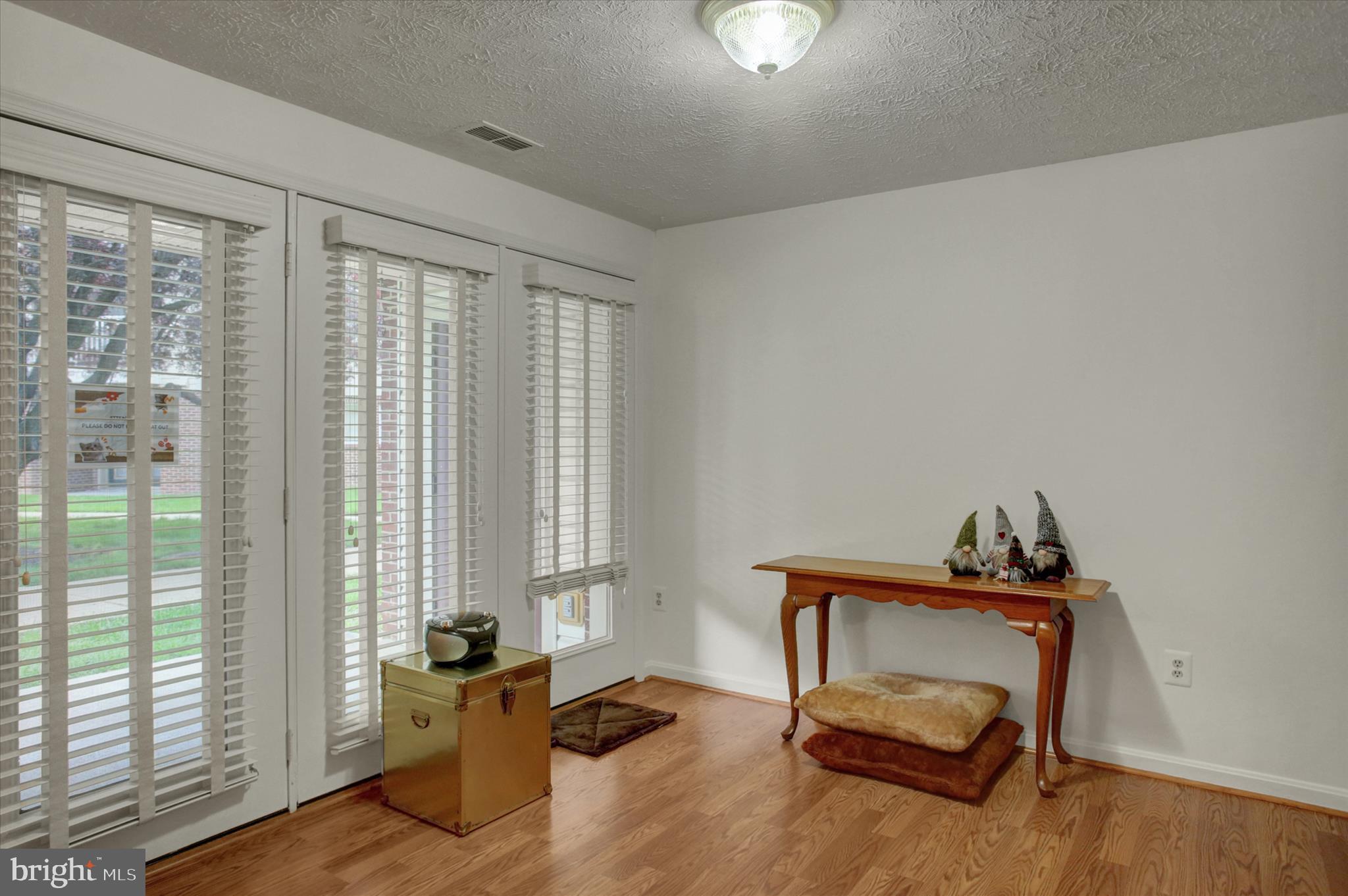 2108 Whitehall Road, Unit BC Frederick, MD 21702 - Photo 8 of 35 a living room with furniture and large windows