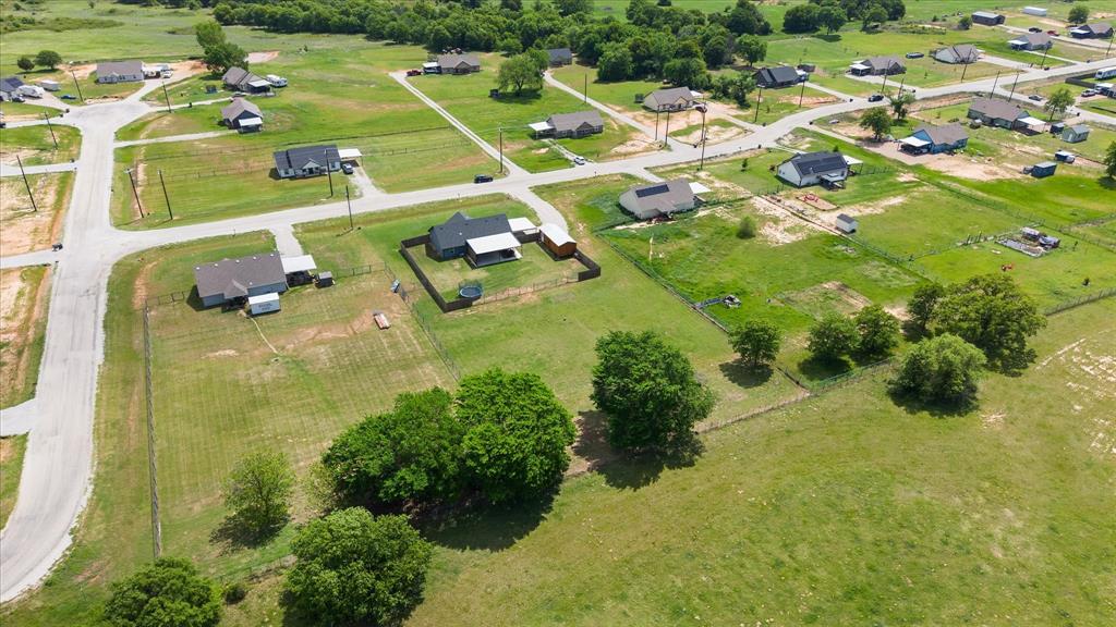 2004 Brown Loop Poolville, TX 76487 - Photo 33 of 36 a picture of houses with outdoor space