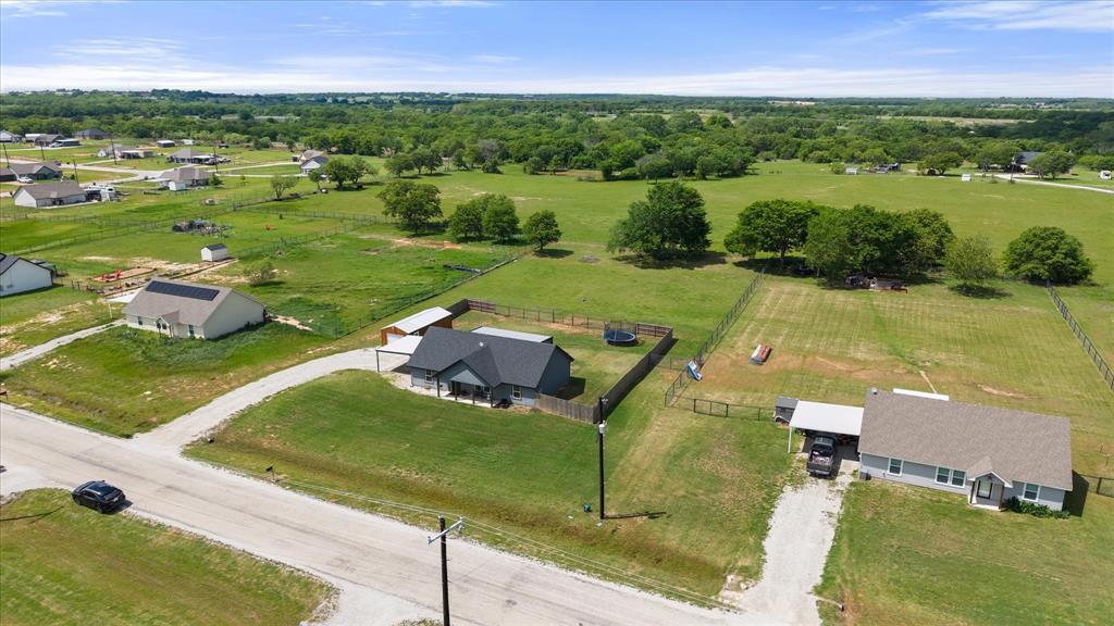 2004 Brown Loop Poolville, TX 76487 - Photo 34 of 36 an aerial view of a house with a yard lake view and mountain view in back