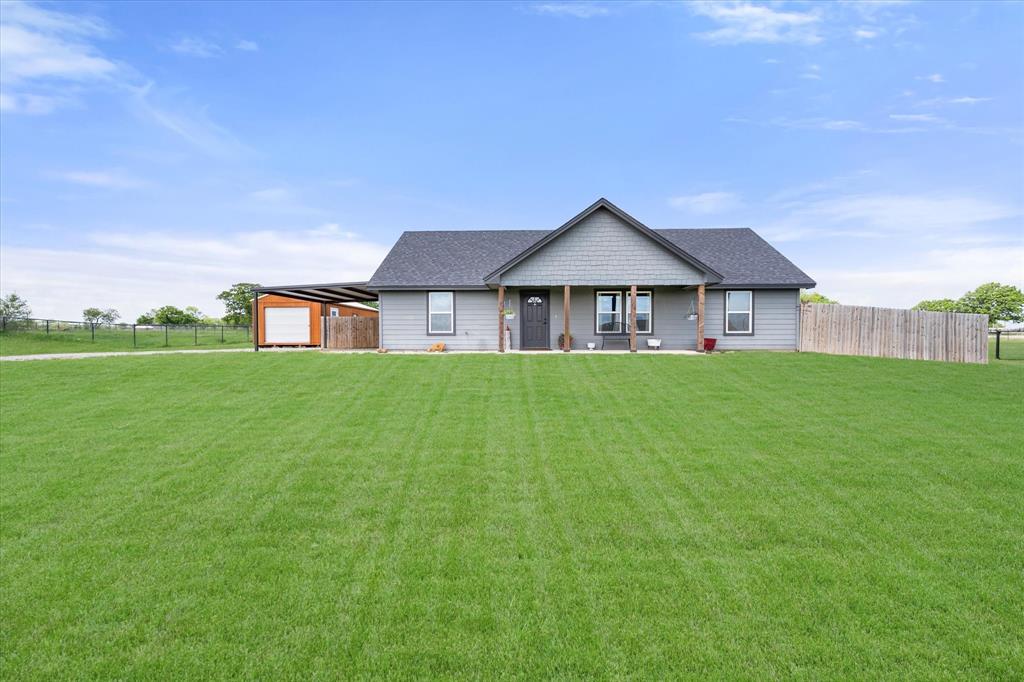2004 Brown Loop Poolville, TX 76487 - Photo 5 of 36 a house with a garden space