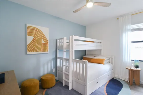 a room with wooden floor and white walls