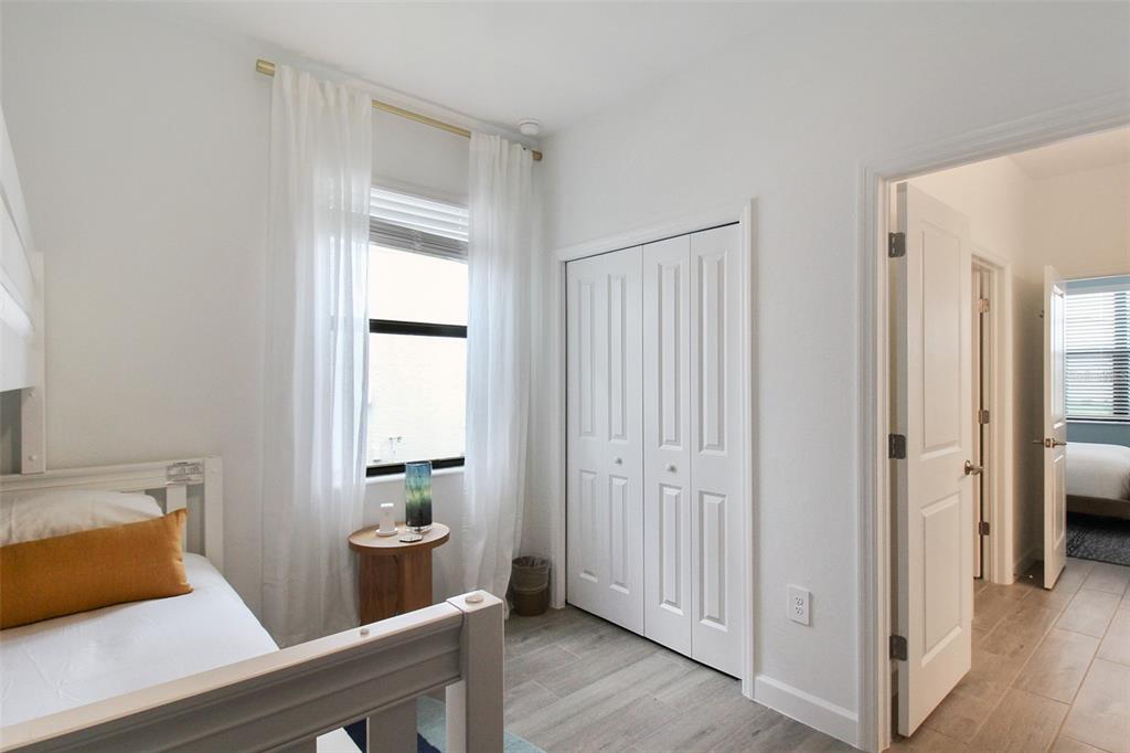 15025 Sea Salt Way Bradenton, FL 34211 - Photo 17 of 64 a room with wooden floor and white walls