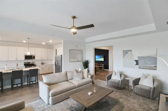 a living room with furniture and a couch