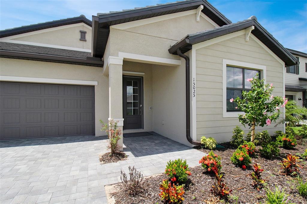 15025 Sea Salt Way Bradenton, FL 34211 - Photo 3 of 64 a front view of a house with entryway