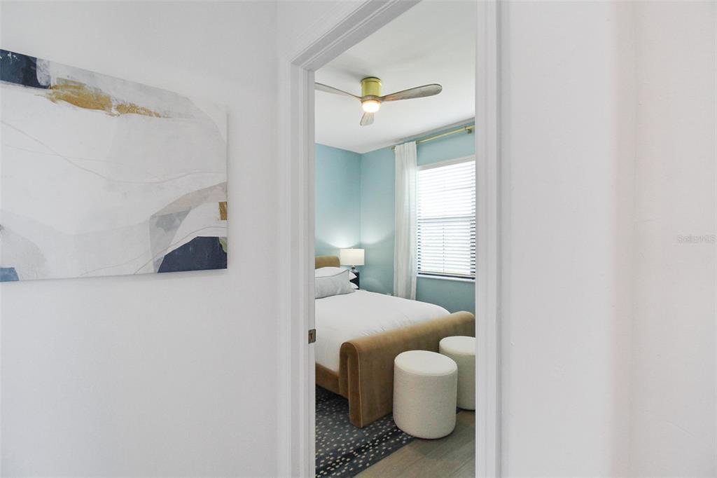 15025 Sea Salt Way Bradenton, FL 34211 - Photo 6 of 64 a bedroom with a bed and window