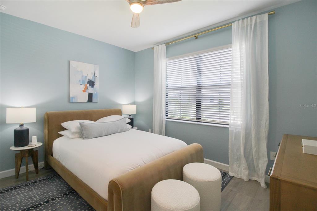 15025 Sea Salt Way Bradenton, FL 34211 - Photo 7 of 64 a bedroom with a bed and a window