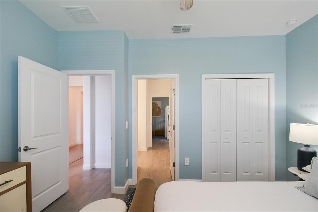 15025 Sea Salt Way Bradenton, FL 34211 - Photo 10 of 64 a bedroom with a bed and a couch