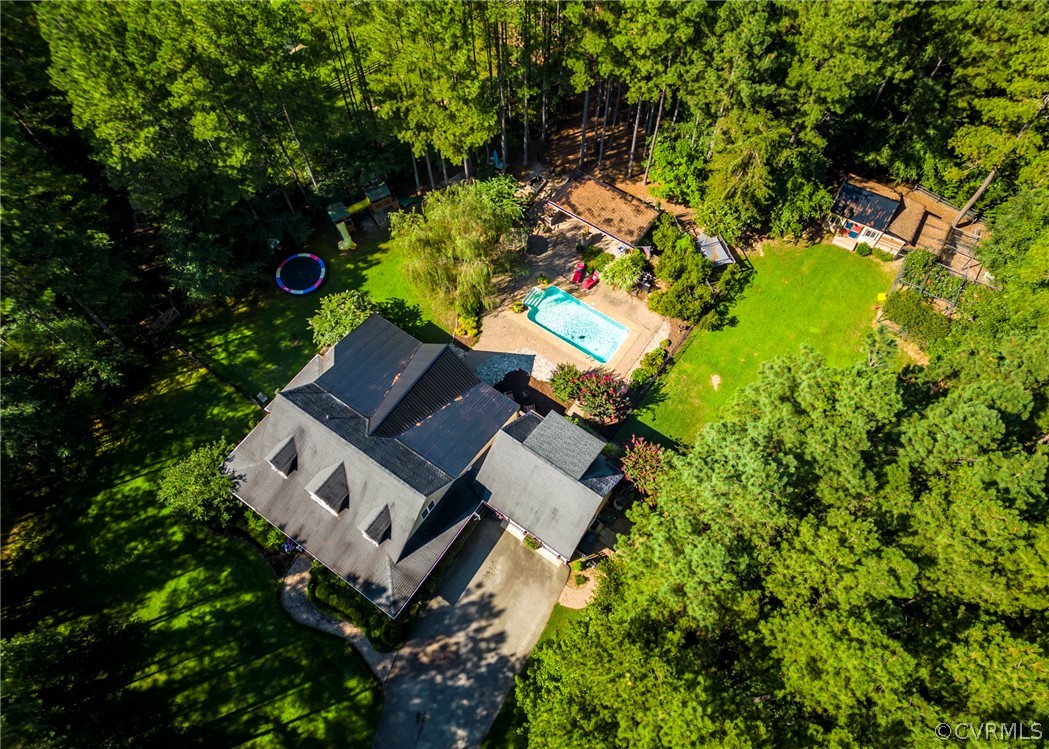 5776 Moore Creek Road Powhatan, VA 23139 - Photo 20 of 45 an aerial view of a house with a yard