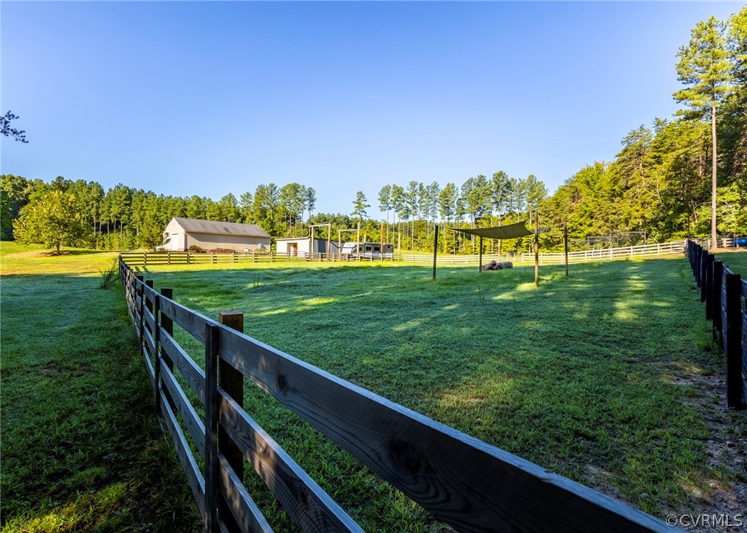 5776 Moore Creek Road Powhatan, VA 23139 - Photo 4 of 45 a view of a garden with an outdoor space