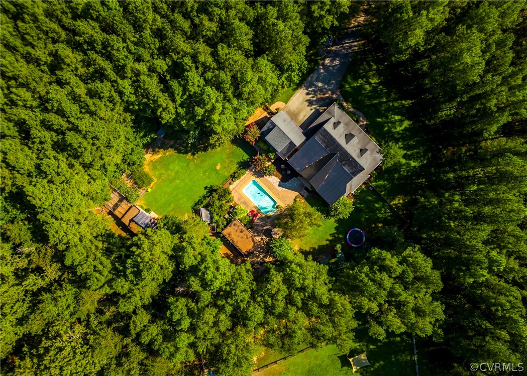 5776 Moore Creek Road Powhatan, VA 23139 - Photo 41 of 45 an aerial view of a house with a garden