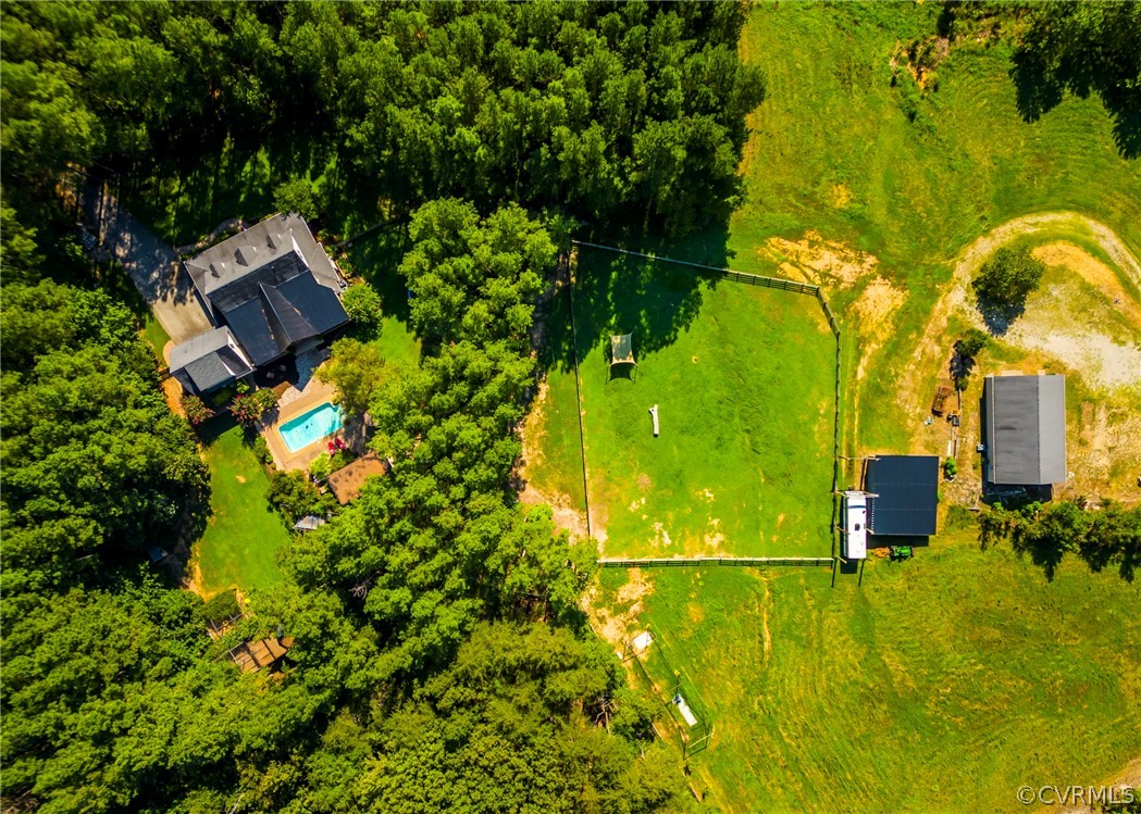 5776 Moore Creek Road Powhatan, VA 23139 - Photo 42 of 45 an aerial view of a house with a yard