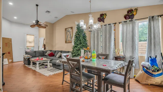 a outdoor space with furniture and chandelier