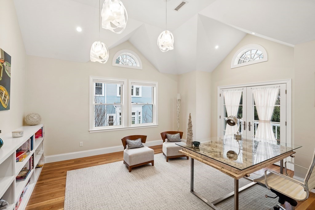 351 Otis Street Newton, MA 02465 - Photo 11 of 30 a living room with furniture and a window