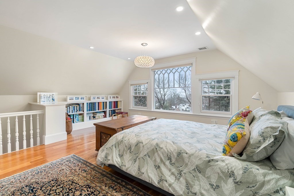 351 Otis Street Newton, MA 02465 - Photo 20 of 30 a bed room with a bed and a window