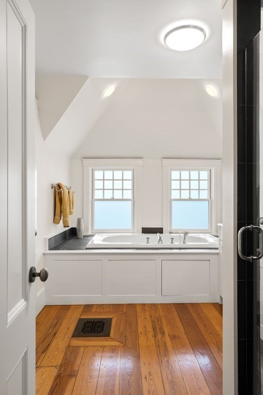 351 Otis Street Newton, MA 02465 - Photo 22 of 30 a kitchen with a sink and windows