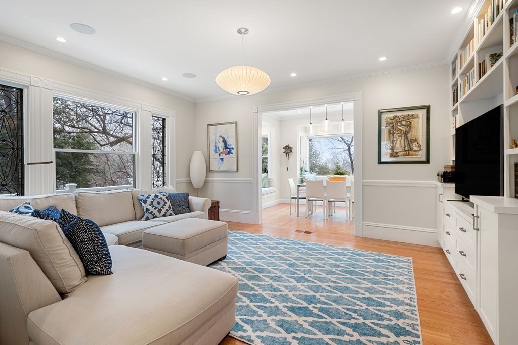 351 Otis Street Newton, MA 02465 - Photo 6 of 30 a living room with furniture and a flat screen tv