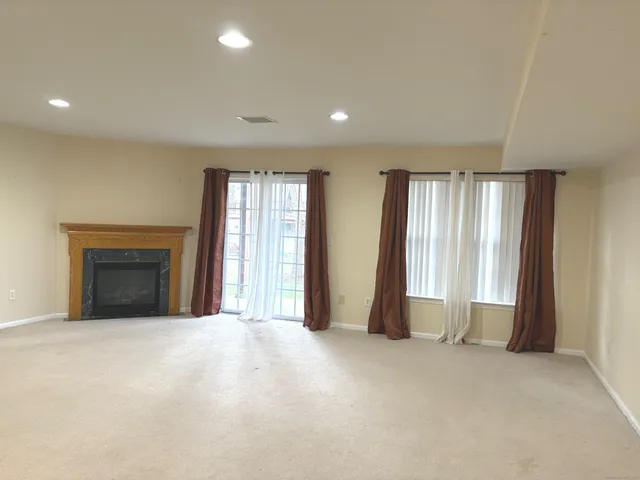 an empty room with windows