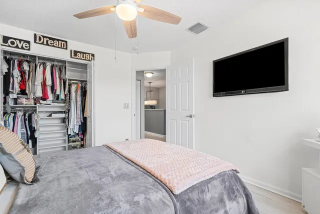 a view of a workspace with furniture and a livingroom
