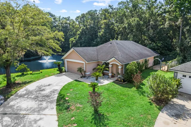 a aerial view of a house with garden