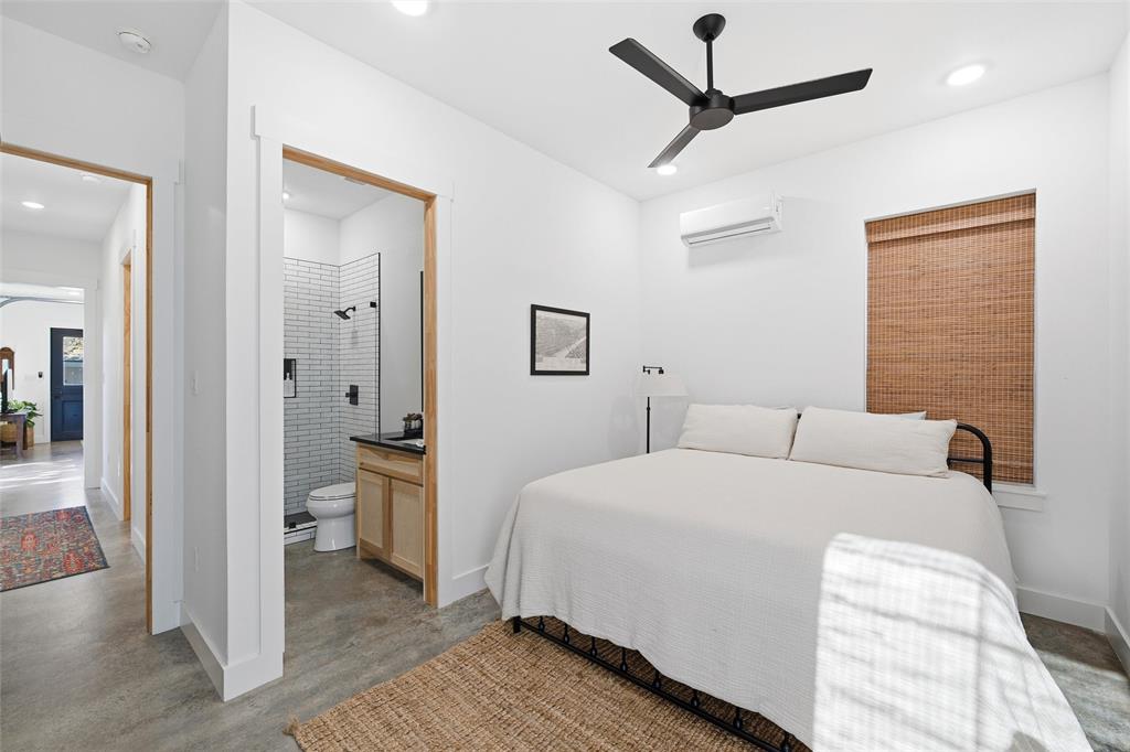 632 South 7th Street Waco, TX 76706 - Photo 6 of 10 a bedroom with a bed and a view of bathroom