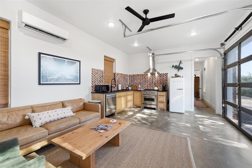 632 South 7th Street Waco, TX 76706 - Photo 7 of 10 a living room with furniture and kitchen view