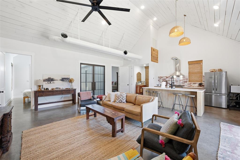 632 South 7th Street Waco, TX 76706 - Photo 9 of 10 a living room with furniture and a kitchen view