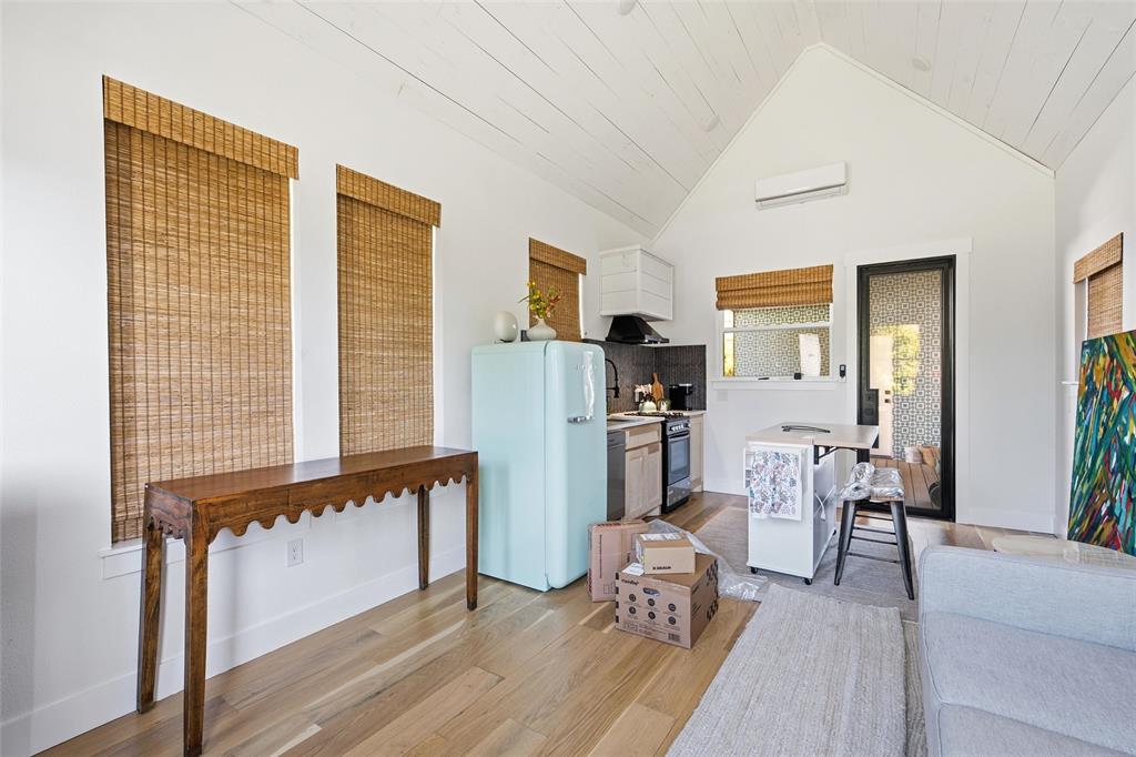 632 South 7th Street Waco, TX 76706 - Photo 10 of 10 a living room with furniture windows and a wooden floor