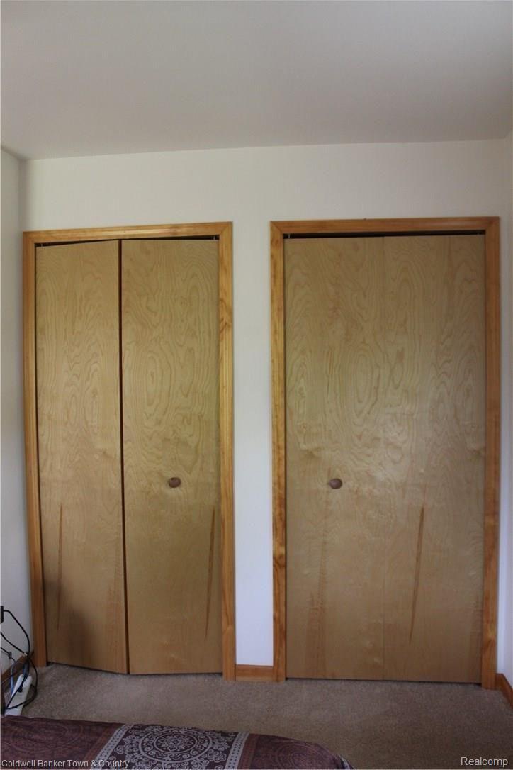 11882 Knob Hill Road Brighton, MI 48114 - Photo 21 of 41 Master bedroom double closets