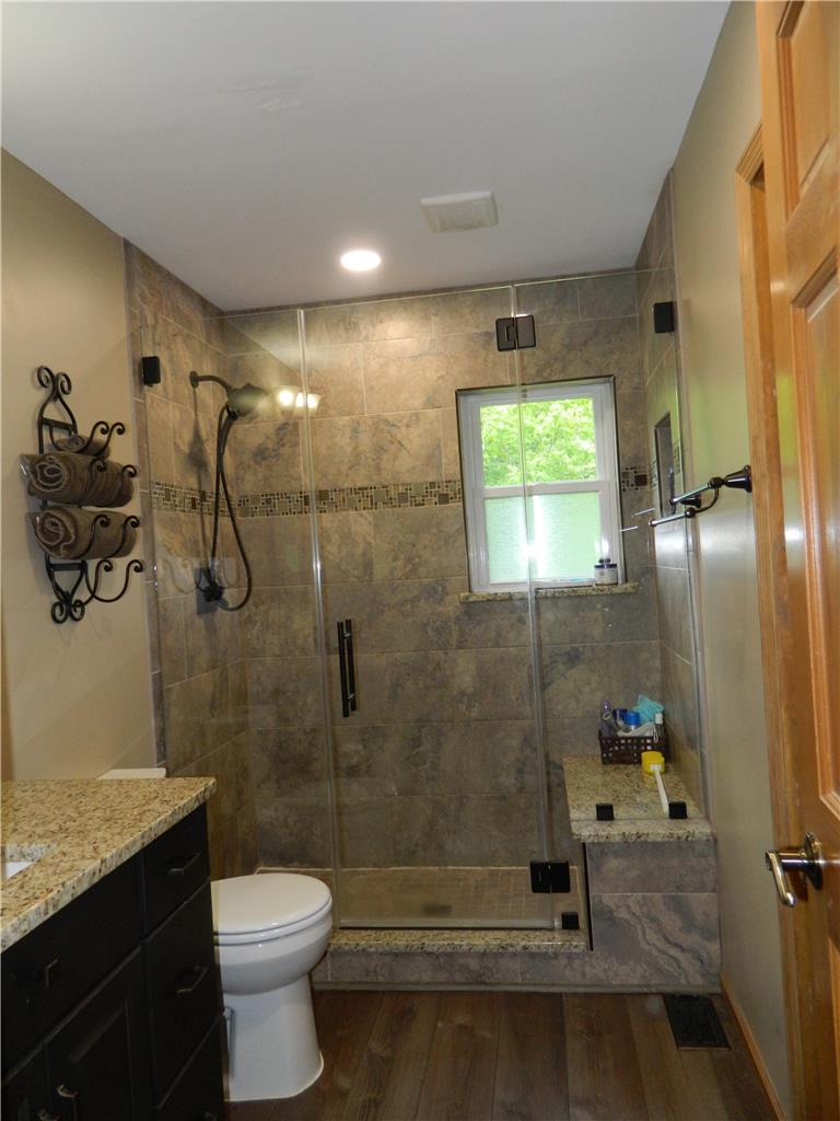 328 Pin Oak Road Stroudsburg, PA 18360 - Photo 28 of 37 A well-appointed bathroom with a spacious walk-in shower and elegant tile work.