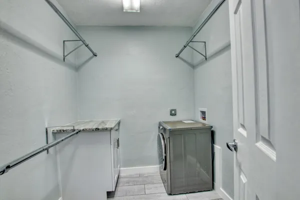 a utility room with a washer and dryer