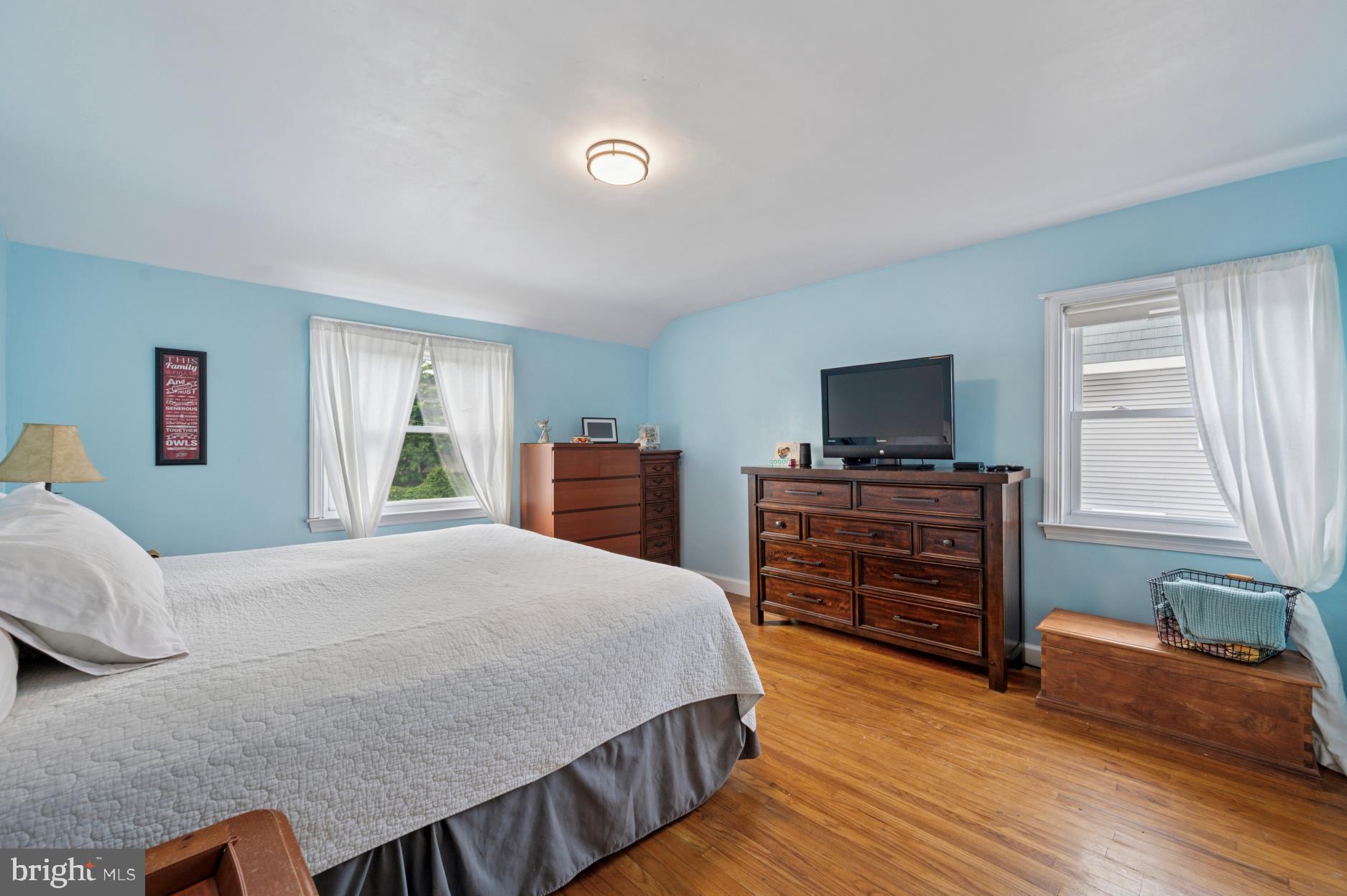 104 Scheivert Avenue Aston, PA 19014 - Photo 12 of 20 a bedroom with a bed and wooden floor