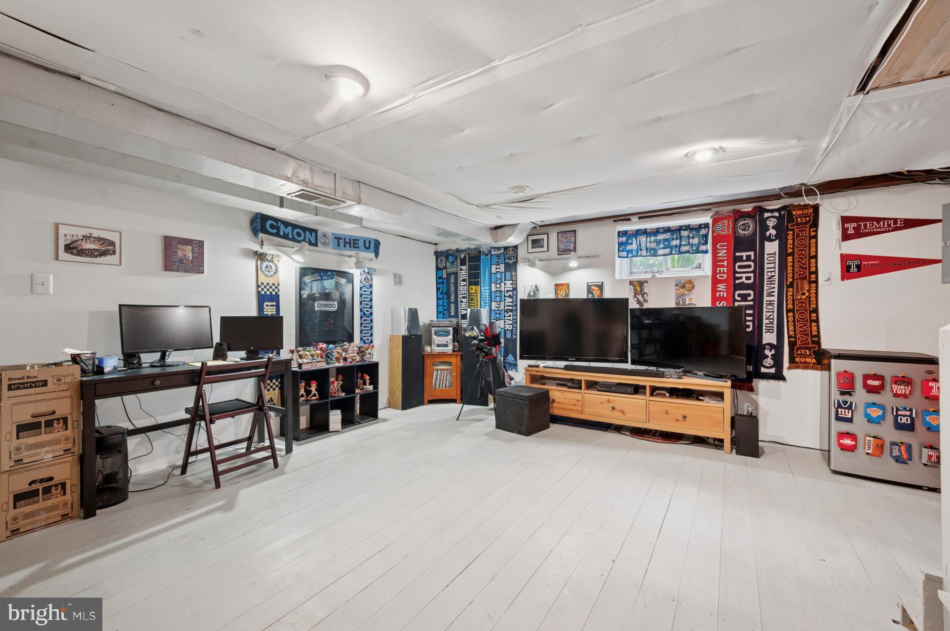 104 Scheivert Avenue Aston, PA 19014 - Photo 17 of 20 a living room with furniture and a flat screen tv