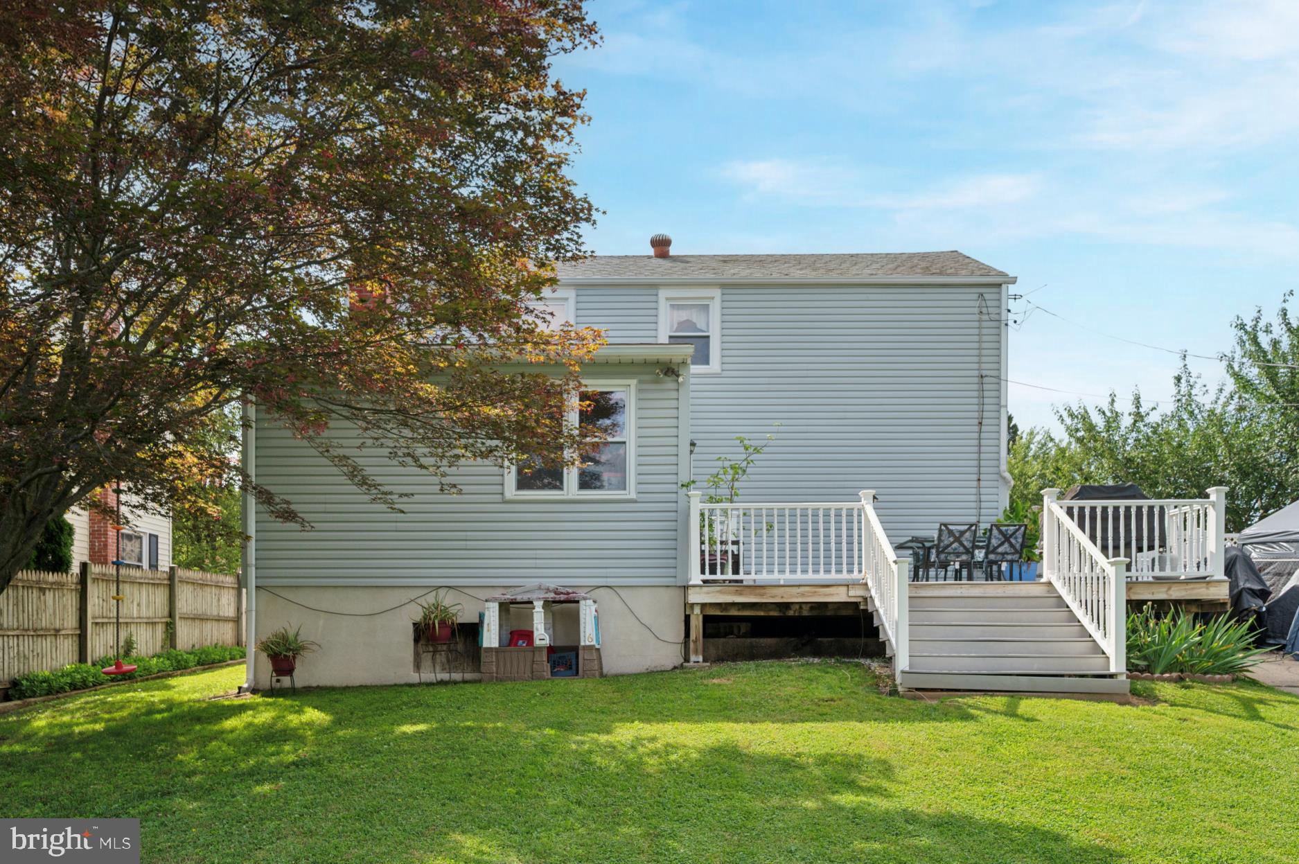 104 Scheivert Avenue Aston, PA 19014 - Photo 19 of 20 a view of house with a yard deck and a tree
