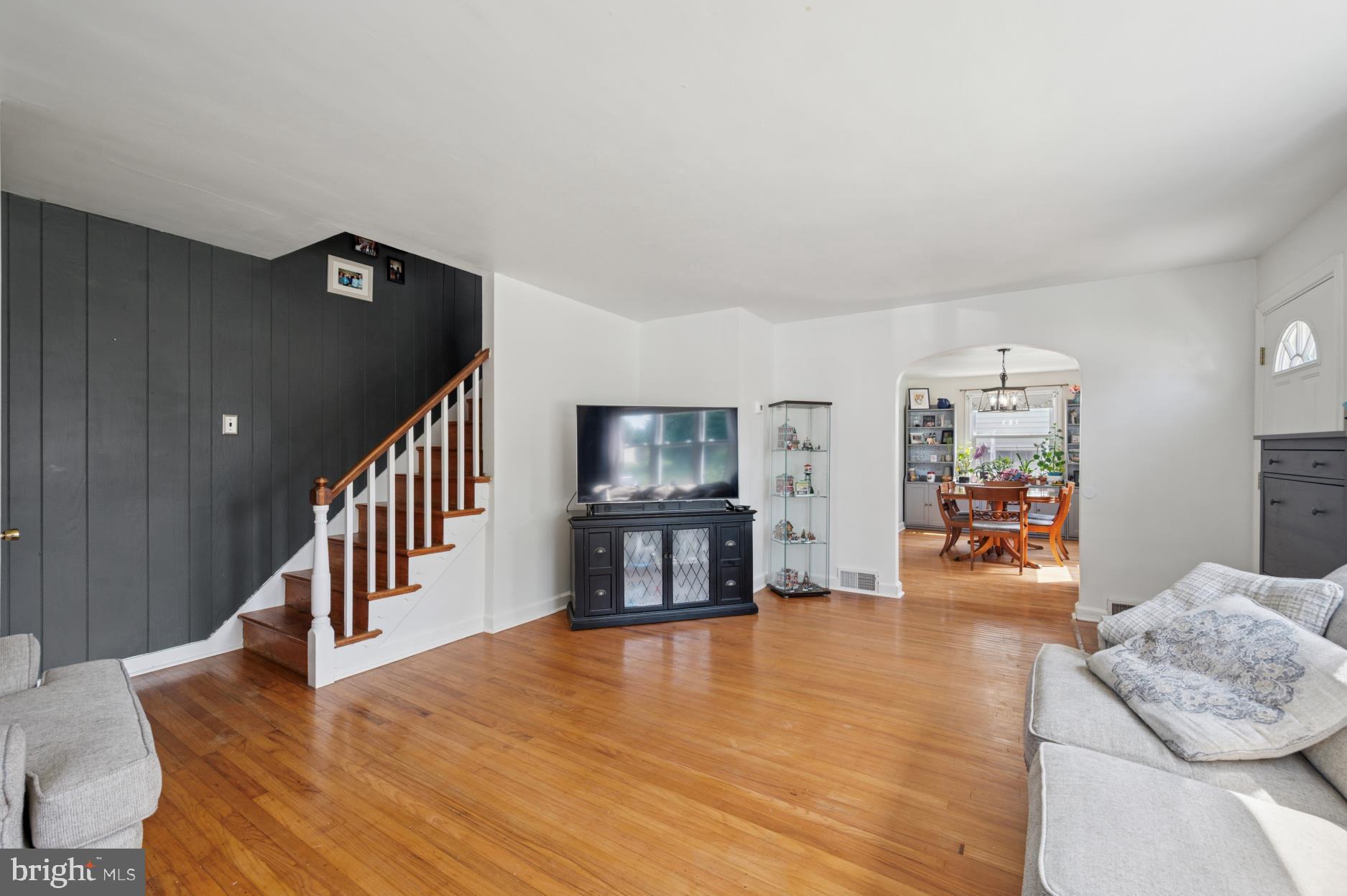 104 Scheivert Avenue Aston, PA 19014 - Photo 3 of 20 a living room with furniture and wooden floor