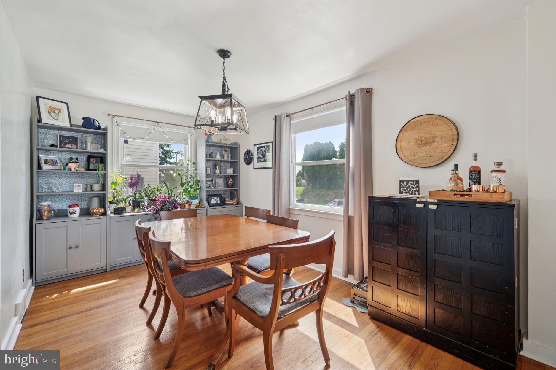 104 Scheivert Avenue Aston, PA 19014 - Photo 7 of 20 a dining room with a wooden table and chairs