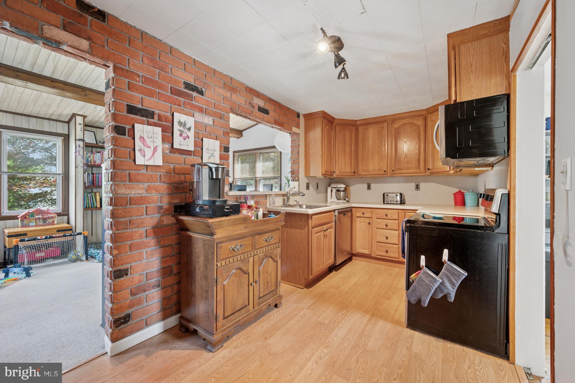 104 Scheivert Avenue Aston, PA 19014 - Photo 9 of 20 a kitchen with a sink cabinets and appliances